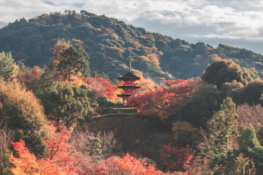 Beautiful fall foliage surrounds Kiyomizu Temple in Kyoto, Japan, a UNESCO World Heritage site.